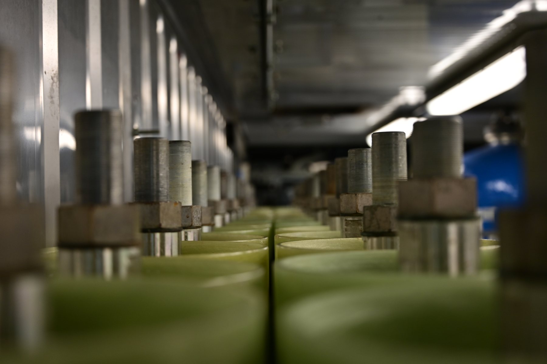 Container interior with stainless steel piping and module connections